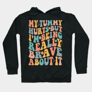 My Tummy Hurts But I_m Being Really Brave About It Groovy Hoodie